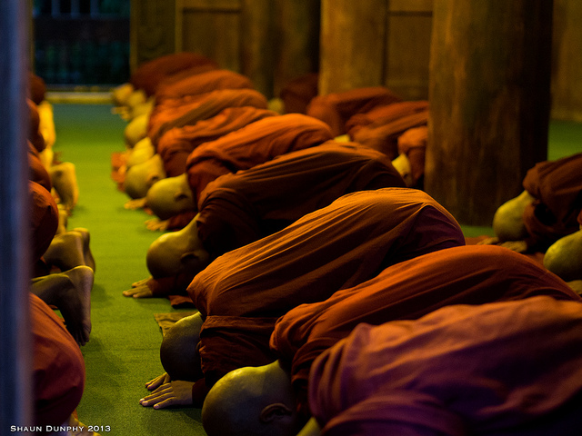 Evening Chanting and worship by Monks of Mandalay, Myanmar. Photograph by Shaun Dunphy via Flickr