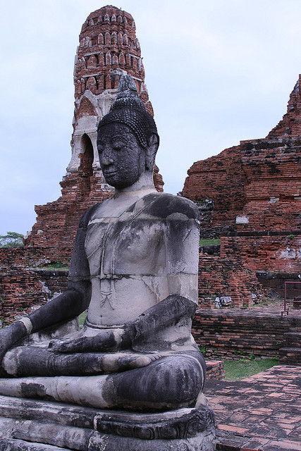 A Statue of the Buddha at Wat Mahatat, Thailand. Photograph by Joe Stump via Flickr